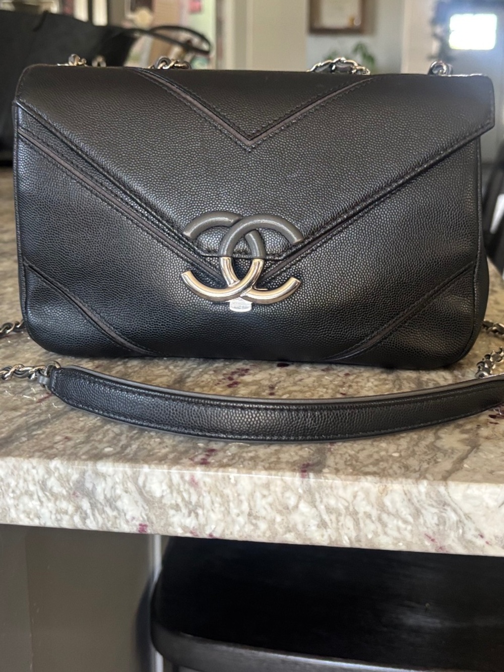 CHANEL Black Chevron Caviar Shoulder Bag with Silver-Tone CC